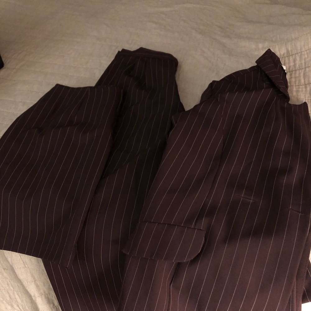 Dark purple/burgundy white pinstripe suit (jacket/skirt/pants). Size 11/12. EUC